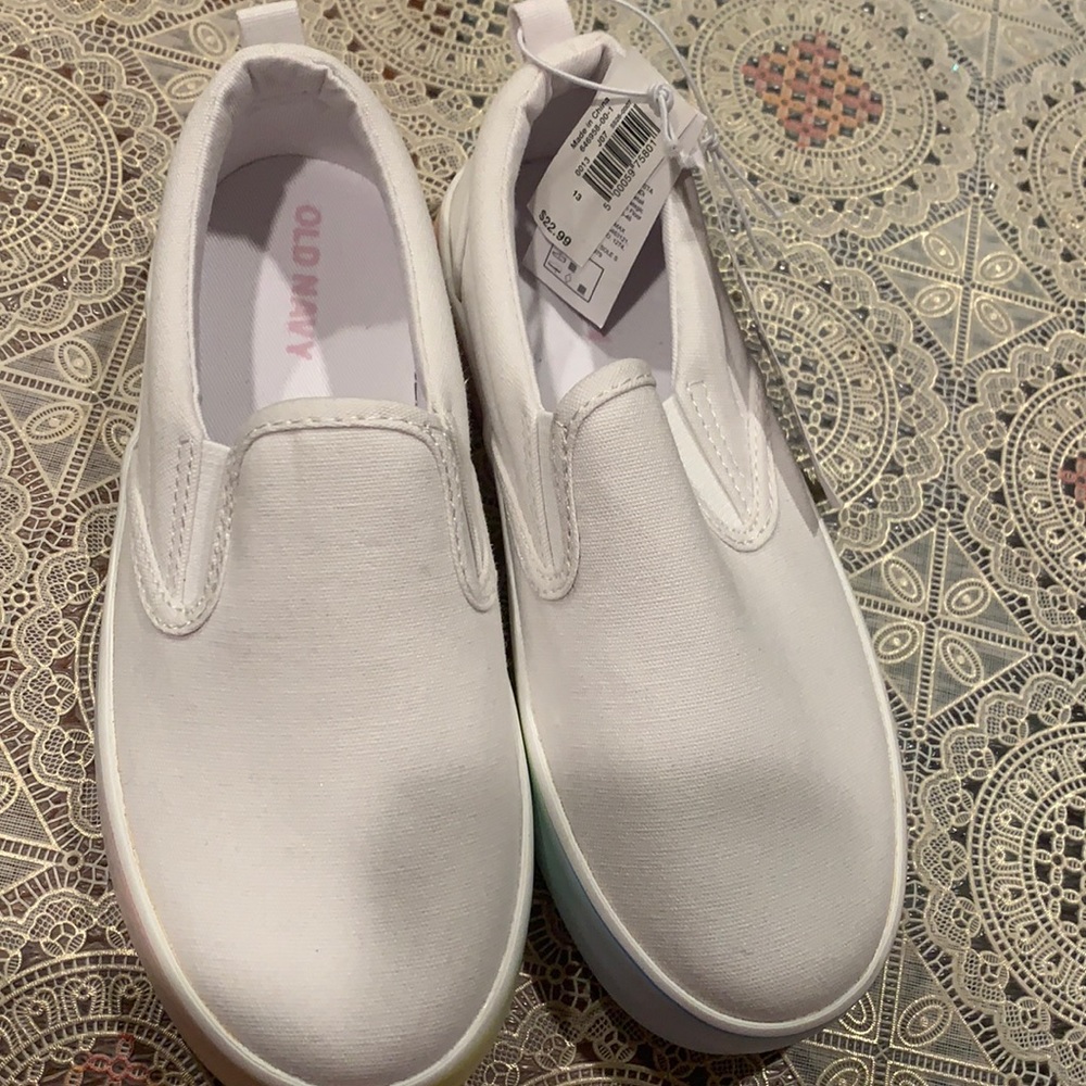 Kids shoes, never worn, still with the tag